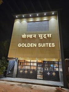 a building with a sign that says golden suites at Hotel Golden Suites - Near Nesco in Mumbai