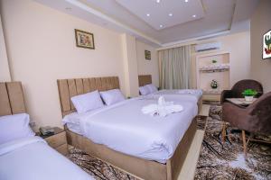 Letto o letti in una camera di Mak Pyramids View