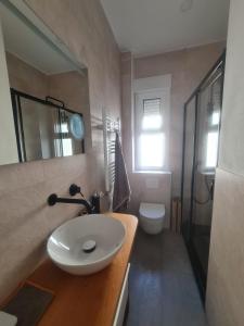 Phòng tắm tại TATI HOMES - Vista Alegre 33.1