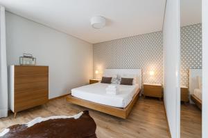Ένα ή περισσότερα κρεβάτια σε δωμάτιο στο GuestReady - Seabreeze Getaway in Lavra