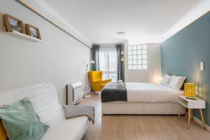 Ένα ή περισσότερα κρεβάτια σε δωμάτιο στο GuestReady - Porto by Pilar Ridge