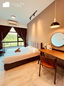 Maison life 小居屋 Jesselton Quay CityPads客房内的一张或多张床位