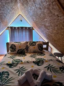 Postel nebo postele na pokoji v ubytování Rural Resort Tron