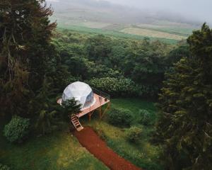an aerial view of a tent in a field at Green Noise Glamping in Fraijanes