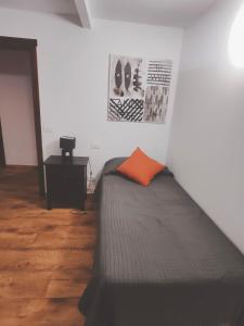 Ένα ή περισσότερα κρεβάτια σε δωμάτιο στο Apartamento Almogrote 2