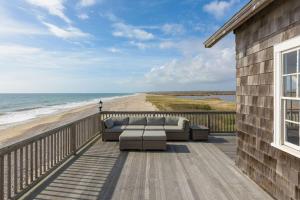 A balcony or terrace at 6.5-Acre Oceanfront Estate