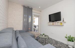 Televízia a/alebo spoločenská miestnosť v ubytovaní Apartment Makarska Zagrebacka