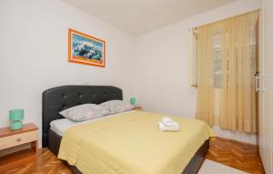 Posteľ alebo postele v izbe v ubytovaní Apartment Makarska Zagrebacka + 13 fotografií