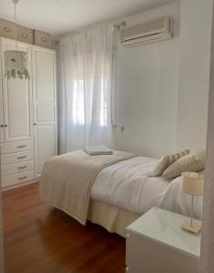 מיטה או מיטות בחדר ב-Casa Paloseto