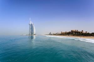 a view of a beach with a tall building at Private Studio Burj Khalifa Area -BEST PRICE in Dubai