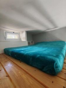 Ліжко або ліжка в номері La Casina Small Loft in Versilia