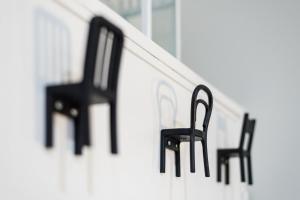 two black chairs sitting on the side of a staircase at GuestReady - Miragaia Historical Sight in Porto
