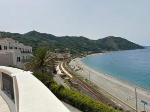 a view of a beach and the ocean at Casa d amare in Gioiosa Marea