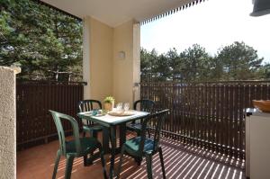 A balcony or terrace at Appartamenti Alemagna