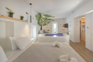 Postel nebo postele na pokoji v ubytování Barbarigos luxury spa apartments + 37 fotografií