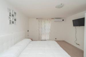 Фотография из галереи Casa al Centro della Costiera в Майори