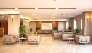 Posezení v ubytování First Joy Hotel + 37 fotografií