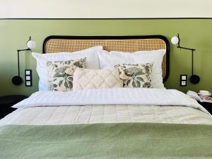 Säng eller sängar i ett rum på Rezydencja Marina Park Reagana