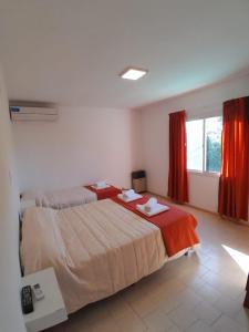 Кровать или кровати в номере HOTEL CRISTAL