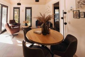 Posezení v ubytování Lille lykke I Tiny House op de Veluwe + 11 fotografií
