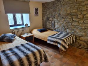 Postel nebo postele na pokoji v ubytování Orri de Planès