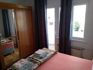 Postel nebo postele na pokoji v ubytování Apartments Silvija
