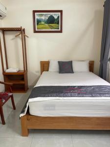a bedroom with a bed in a room at Sen's Homestay in Ninh Binh