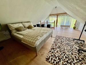Łóżko lub łóżka w pokoju w obiekcie Villa Evy