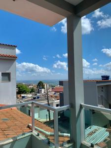 a view from the balcony of a house at Pousada Aconchego De São Thomé in São Thomé das Letras