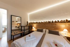 Postel nebo postele na pokoji v ubytování 13 Comuni Ristorante E Albergo + 37 fotografií