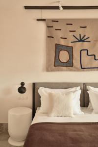 Ein Bett oder Betten in einem Zimmer der Unterkunft Parilio, a Member of Design Hotels
