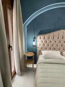 Postel nebo postele na pokoji v ubytování Incanto Luxury Suites