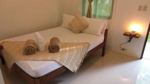 Voodi või voodid majutusasutuse General's Hideout Siargao toas