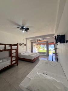 Een bed of bedden in een kamer bij Costa Nueva