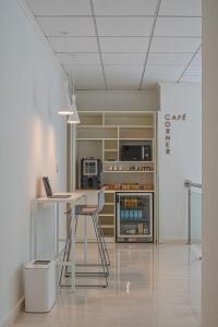 Kuchyň nebo kuchyňský kout v ubytování Hotel Santamarta