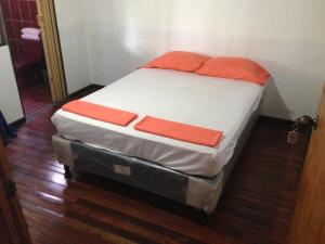 מיטה או מיטות בחדר ב-El Cacique EST 2003