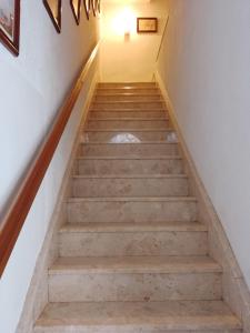 a set of stairs in a house at Terraced house with stunning view close to Mdina in Rabat