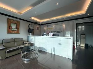 a lobby with a couch and a counter in a store at De UPTOWN Hotel @ Damansara Uptown in Petaling Jaya +16 photos