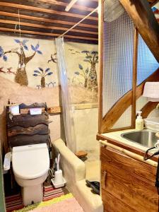 a bathroom with a toilet and a sink at Tida House - Vacation STAY 07404v in Koshimizu-shigai