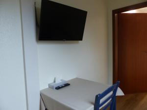 TV a/nebo společenská místnost v ubytování Pension Ziemann