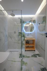 Koupelna v ubytování Cako Rooms Saranda + 37 fotografií