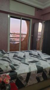 Ένα ή περισσότερα κρεβάτια σε δωμάτιο στο Appartement Mohammed V Airport Top