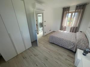 Postel nebo postele na pokoji v ubytování Il Casalone