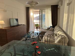 TV o dispositivi per l'intrattenimento presso Front Row Sunset