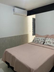 Кровать или кровати в номере Casa em Piranhas Aconchego