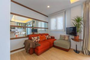 Et opholdsområde på AMAZONIA - Apartamento moderno centrico con Piscina Terraza y Parking