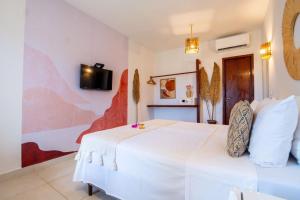 Pousada Solarium de Gostoso客房内的一张或多张床位