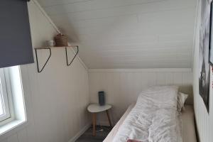 Krevet ili kreveti u jedinici u objektu Feriehuset Holmen