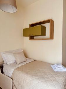 Postel nebo postele na pokoji v ubytování Fresia B&B