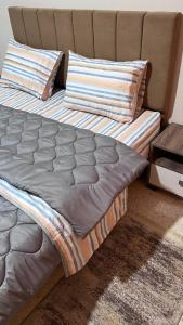 Кровать или кровати в номере Chez-moi